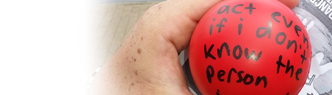 A person holds a ball with the words 'Act even if I don't know the person.'